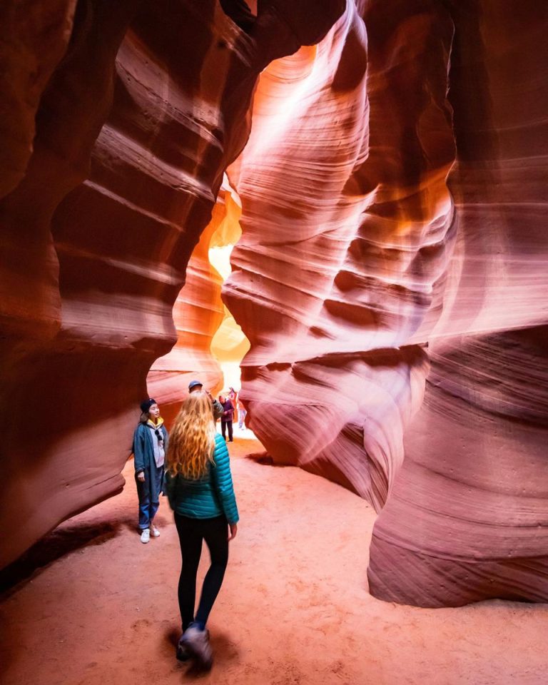 Antelope Canyon Navajo Tours group exploring rock formations. Photo credit Antelope Canyon Navajo Tours Facebook 768x960