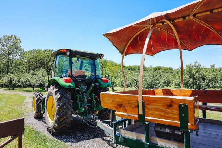 Arbor Day Farm in NE group tour tractor. Photo credit Arbor Day Farm Facebook 768x512