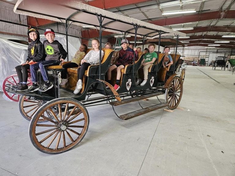 Cheyenne Frontier Days Old West Museum kids in a wagon. Photo credit Cheyenne Frontier Days Old West Museum Facebook 768x576