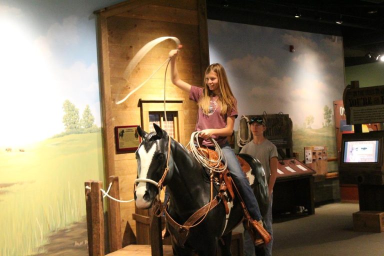 Chisholm Trail Heritage Center pretending to cowboy. Photo credit Chisholm Trail Heritage Center Facebook 768x512