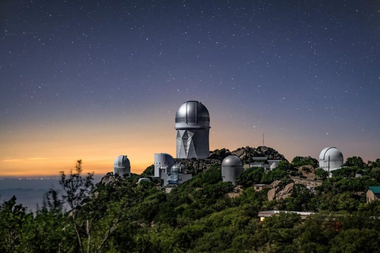 Kitt Peak National Observatory exterior at night. Photo credit Facebook 768x512