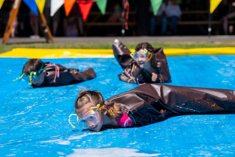 Northwest Trek Wildlife Park kids being seals. Photo credit Facebook 768x512