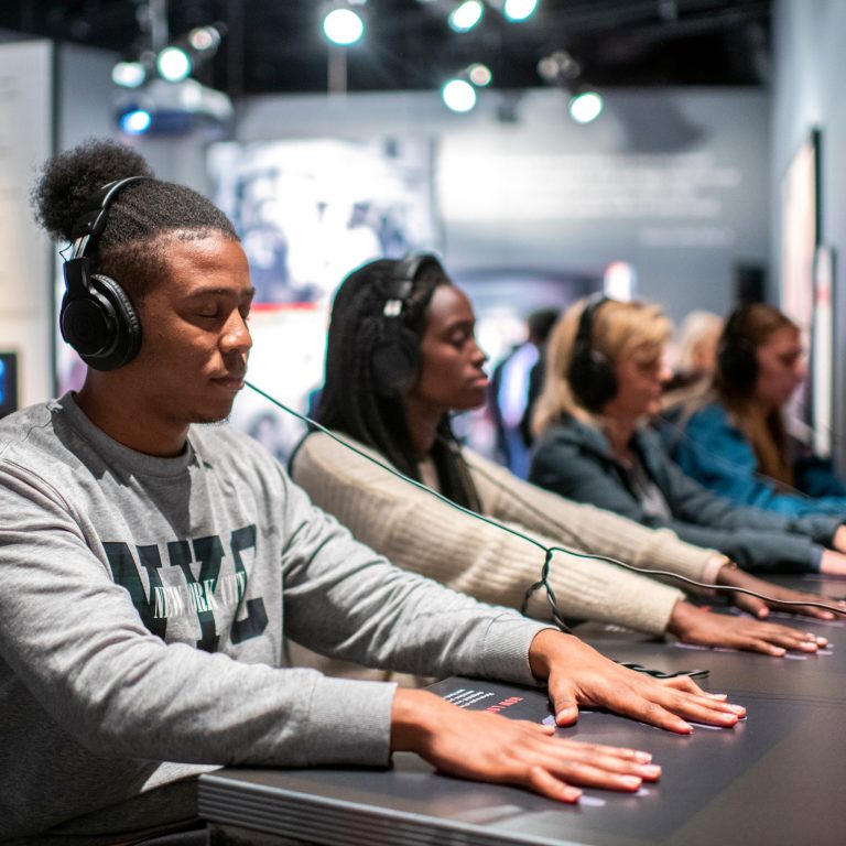 National Center for Civil and Human Rights exhibit lunch counter sit in simulation. Photo credit National Center for Civil and Human Rights Facebook 768x768