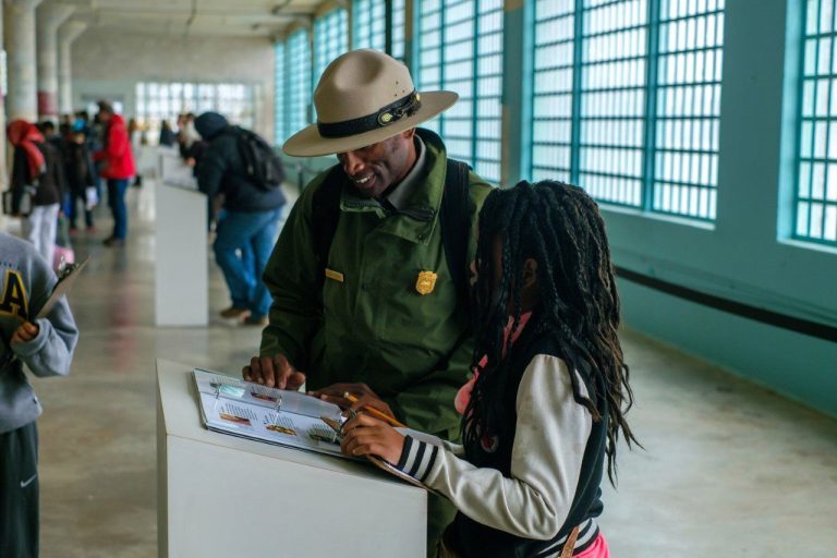 Alcatraz Island a student with a park ranger. Photo credit NPS Justin Scott 768x512