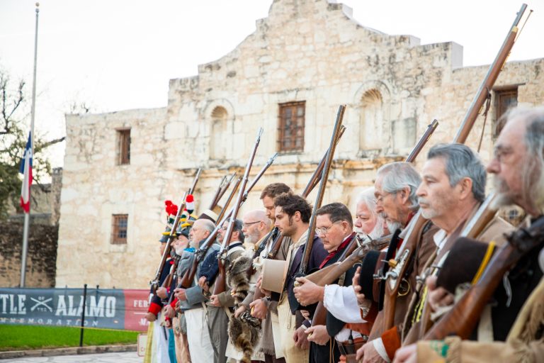 The Alamo with costumed employees during a historical demonstration. Photo credit The Alamo Facebook 768x512