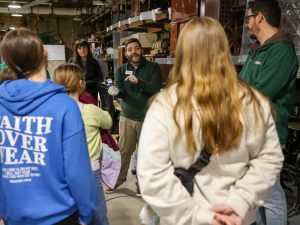 Students-learn-about-Iowas-history-during-an-in-depth-tour-of-artifacts-and-exhibits-at-the-State-Historical-Society-of-Iowa.-Credit-State-Historical-Society-of-Iowa-Facebook