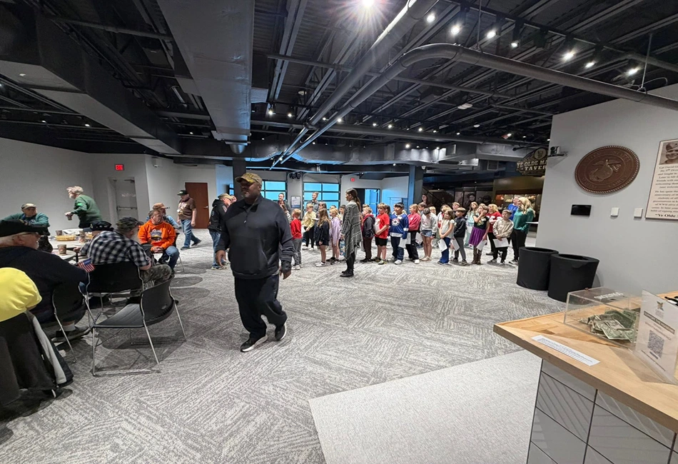 Students visit veterans at Sullivan Brothers Iowa Veterans Museum in Waterloo. Credit - City of Waterloo, Iowa - City Hall Facebook
